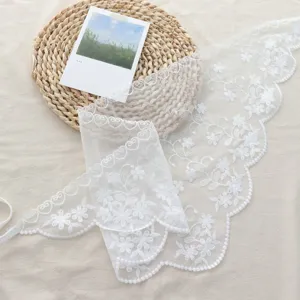 White lace floral triangle scarf layered accessory, delicate embroidery detail for women outfit.