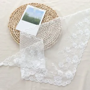 White lace floral trim mesh fabric for layering triangle scarf and headscarf crafting.