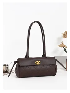 Dark brown quilted shoulder bag with long straps and gold clasp for women everyday style.