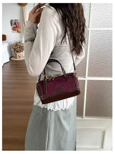 Retro contrast color Boston bag women detail view, stylish shoulder and crossbody handbag for commute.