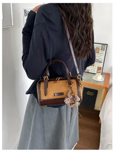 Retro color-block Boston bag detail, stylish PU leather handbag with shoulder strap for women.