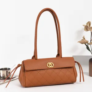 Retro brown quilted shoulder bag for women with long handles and elegant gold clasp design.