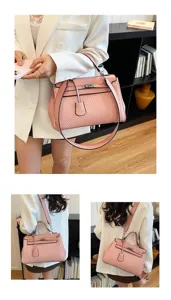Borsa a mano rosa retro da donna, elegante borsa tote con tracolla e design alla moda.