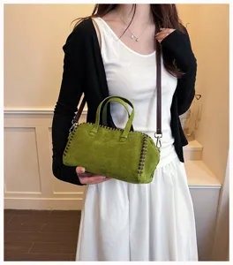 Elegante vintage grüne Wildleder Boston Handtasche für Damen, modische Umhängetasche.