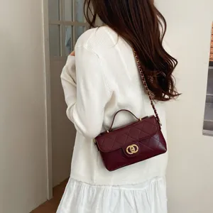 Burgundy quilted chain shoulder bag detail display, stylish women's crossbody mini bag.