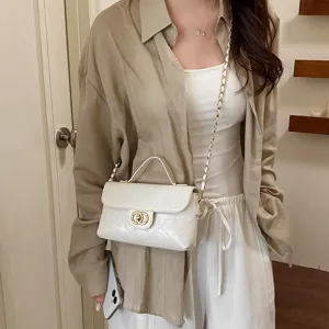 White quilted crossbody bag for women, chic PU leather chain shoulder bag with top handle.