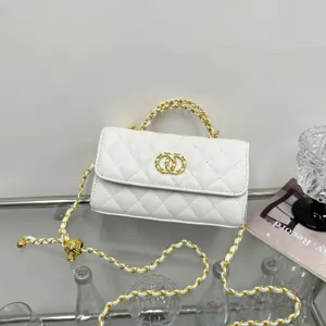 Elegant white quilted crossbody bag with gold chain strap, stylish chic fashion handbag for women.