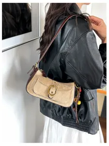 Retro suede shoulder bag for women, contrast color patchwork crossbody bag with metal buckle.