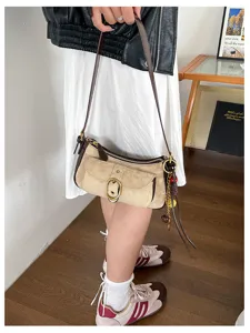 Retro suede cross-body bag for women, stylish contrast shoulder bag with metal buckle.