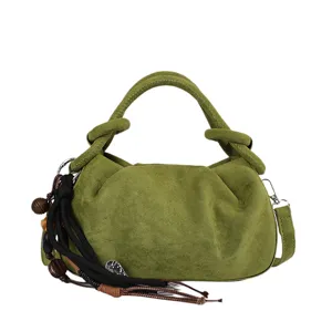 Retro green suede shoulder bag for women, casual pleated dumpling underarm handbag.