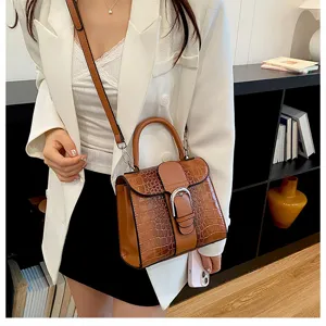 Detailed view of retro crocodile pattern handbag, stylish top handle design for daily chic look.