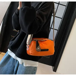 Oranje schoudertas voor dames casual lichte nylon crossbody tas modieuze handtas