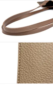 Vue détaillée du sac en cuir grainé, poignée robuste avec coutures fines et soignées.