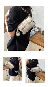 Sac à main tissé argenté pour femme, élégant sac bandoulière métallique avec chaîne et nœud.
