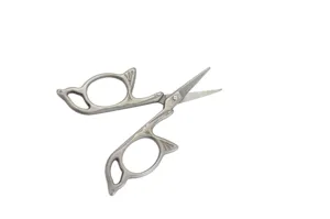 Detailed view of retro handmade steel titanium-plated embroidery and craft scissors.
