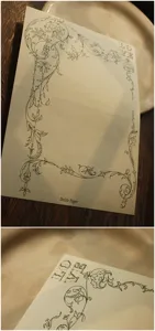 Papier à lettre floral vintage avec un design de bordure botanique délicat pour écrire