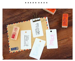Vintage wooden rubber stamps set for DIY journaling, retro botanical flower postmark designs.