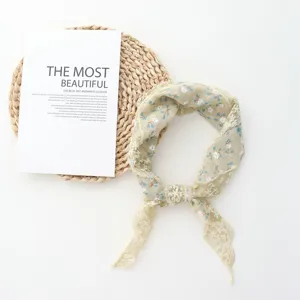 Retro floral lace triangle scarf detail view, elegant hair band for stylish daily outfits.
