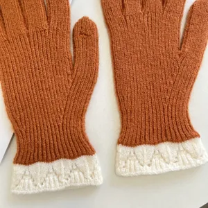 Winter warm knitted gloves for women, orange touch screen five finger short gloves detailed view.