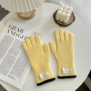 Yellow knit gloves with black cuffs for women, warm winter daily wear and student accessories.