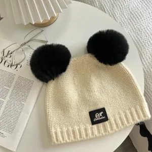Cute dual pom pom knit winter warm thick soft beanie hat for women and girls.