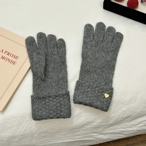 Winter warm knitted gloves for women, solid gray thick touchscreen gloves with lovely heart charm.