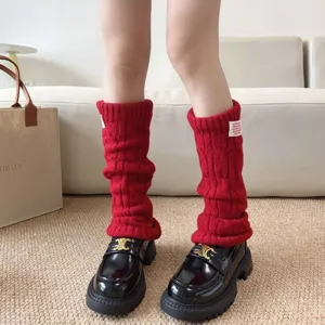 Chauffe-jambes tricotés rouges confortables pour femmes, chaussettes d'hiver chaudes et stylées.