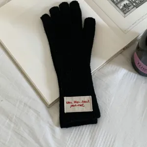 Women's black knit long touchscreen gloves with cute red embroidery patch for winter.