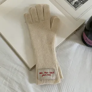 Women's warm winter knit long split finger gloves, minimalist beige wool blend touchscreen gloves.