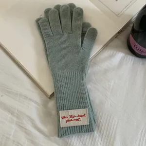 Winter warm wool blend knitted long touchscreen gloves with cute embroidered letter cuff detail.