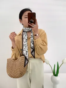 Elegant black and white floral skinny scarf for women, versatile neckerchief or hair ribbon.