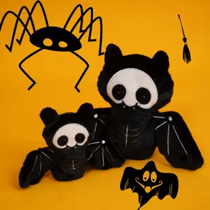 Cute black bat plush toy detail showing soft fabric and cute face for Halloween decoration.