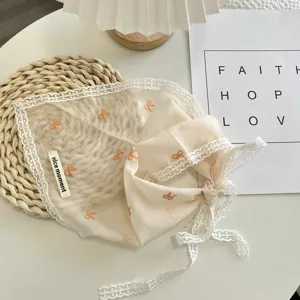 Beige lace triangular headscarf detail, sweet bow embroidery and cute side label design.