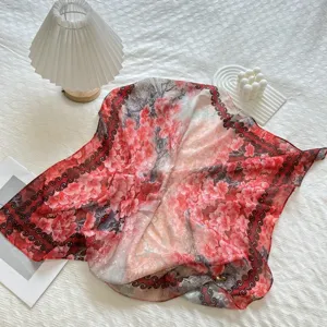 Detailed shot of lightweight red floral square scarf, elegant retro border, spring sun protection.