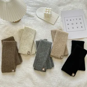 Long knit leg warmers for women, solid color winter warm arm sleeves and cozy boot cuffs.