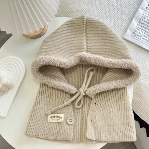 Detailed shot of the knitted hooded scarf in khaki, featuring plush lining and cute buttons.