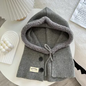 Grey knitted hooded shawl scarf with plush lining, buttons, and warm winter ear protection.