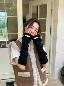 Longs gants tricotés sans doigts pour femmes, chauffe-bras d'hiver automne douillets noirs.