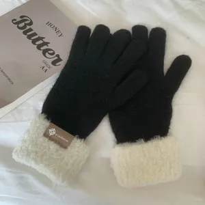 Thickened warm knit gloves for women winter, black gloves with fluffy white plush cuffs.