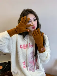 Winter warm knitted long gloves for women, cute brown five-finger gloves, cozy autumn wear.