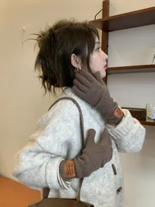 Brown knitted gloves for women winter warm five-finger gloves cozy casual wear detail view