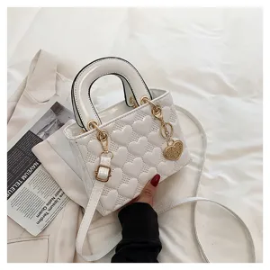 White heart quilted handbag for women, stylish top handle shoulder bag with cute heart pendant.