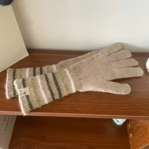 Damen Winter lange Strickhandschuhe, klassische gestreifte Bündchen warme Strickfäustlinge.