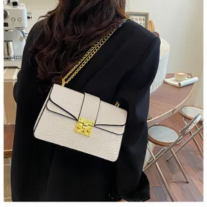 Stylish white crocodile pattern chain shoulder bag with gold lock clasp for women daily use.