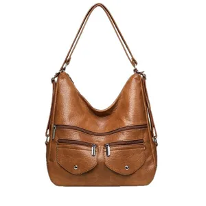 Sac à bandoulière souple marron classique pour femme avec multiples poches pour le quotidien.