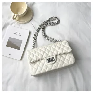 White quilted chain shoulder bag, classic flap design with metal turn-lock for women.