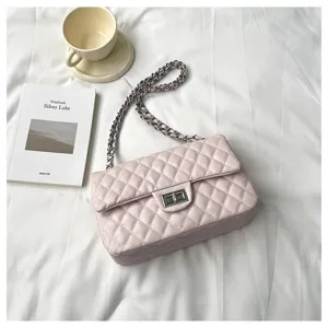 Quilted chain shoulder bag for women, stylish pink crossbody bag with metal strap.