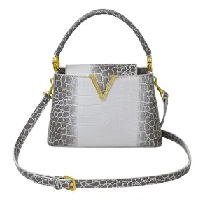 Elegant crocodile pattern handbag with crystal V clasp, stylish shoulder crossbody bag.