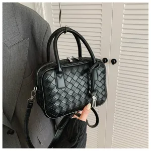 Black woven leather handbag detail, stylish shoulder crossbody bag for women spring 2026.