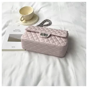 Pink quilted chain shoulder bag, elegant flap design with metal turn-lock closure for daily wear.